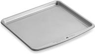 🍪 wilton 8.5-inch x 10-inch toaster oven sheet: compact and versatile baking tray logo