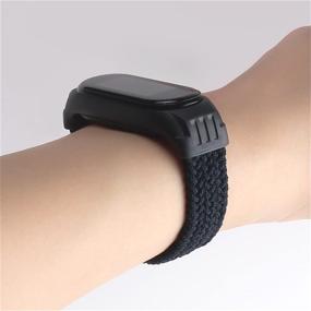 img 1 attached to EMIOBAND Braided Solo Loop Silicone Fabric Stretchable Nylon Strap - Compatible with Xiaomi Mi Band 5, Mi Band 4, and Mi Band 3