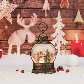 img 1 attached to 🎅 Enchanting TIJNN 8.5" Snow Globes Christmas with Music - Stunning Indoor Christmas Decorations & Mesmerizing Snow Spinning Water - Perfect Home Decoration and Gift