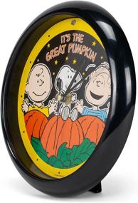 img 1 attached to 🎃 Great Pumpkin Round Sound Clock by Mark Feldstein & Associates - Includes Stand, Ideal Pumpkin Decor for Peanuts Fans