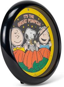 img 4 attached to 🎃 Great Pumpkin Round Sound Clock by Mark Feldstein & Associates - Includes Stand, Ideal Pumpkin Decor for Peanuts Fans