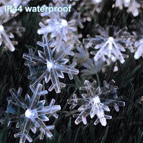 img 2 attached to 🎄 100 LED 33 FT Outdoor Christmas Fairy Lights - Twinkle Star Solar Snowflake String Lights with 8 Lighting Modes, Waterproof for Holiday New Year Wedding Party, Xmas Tree, Garden Decor - Cool White