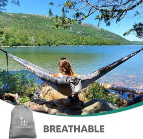 img 2 attached to 🏕️ The Adventurer Bundle: High Hammocks for Ultimate Hanging Experience - Includes Hammock, Straps, Carabiner, Mosquito Netting, Rain Tarp, Guy Lines, and Stakes