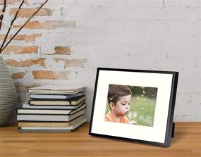 img 1 attached to Frametory 8x10 Aluminum Frame with Ivory Mat for 5x7 Pictures - Tabletop/Wall Display, Easel Stand & Sawtooth Hanger - Perfect for Baby Photos, Artwork, Prints, and Nature - Black