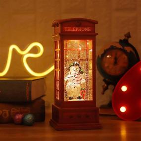img 4 attached to 🎄 JEDAWN Christmas Lantern - Musical Lighted Snow Globe Decor with Swirling Snow - Telephone Booth Design for Festive Home Decoration and Gifts