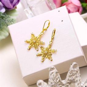 img 2 attached to 👑 EVER FAITH Sterling Silver Clear CZ Winter Snowflake Leverback Earrings for Women - Elegant Ear Accessories Jewelry