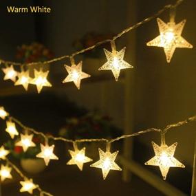 img 2 attached to 🌟 Xingpold Star String Lights - Battery Operated Christmas Star Lights with Remote Control - 50 LED 16.4 ft Color Changing Star Fairy Lights - Dimmable Star Lights for Bedroom, Kids Tent, Christmas Garden, Balcony Decor