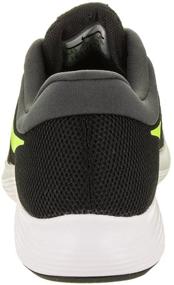 img 2 attached to 👟 Nike Revolution Running Shoes - Black Anthracite: Upgrade Your Run with Style