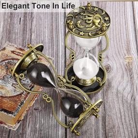 img 1 attached to ⏳ Sun & Moon Engraving Metal Sand Clock: 60 Minute Hourglass Sand Timer for Office Desk Decorative - Antique 1 Hour Glass Sandglass