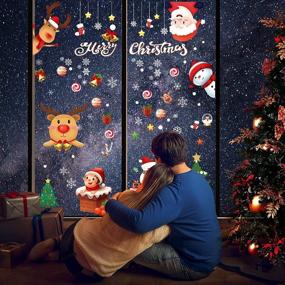 img 3 attached to 🎄 205 PCS of OOKUU Christmas Window Clings - 9 Sheets of Xmas Decals Stickers for Glass Mirror: 8 Reusable Electrostatic & 1 Fluorescent Set with Tree, Snowflake, Reindeer, Santa Claus, Elf Party Decorations