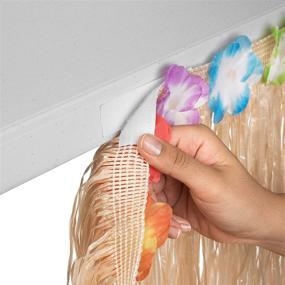 img 1 attached to Hawaiian Luau Grass Table Skirt with 12 Hibiscus Flowers: Thick, Extra-long, Adhesive Included. Ideal Beach, Tiki, Tropical, Island Party, Luau Decoration - 9ft