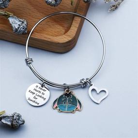 img 1 attached to Whimsical Bracelet Donkey Hippos Eeyore Daisy Hello Kitty Spongebob Cartoon Charm Bracelet: A Must-Have for Fun-Loving Girls