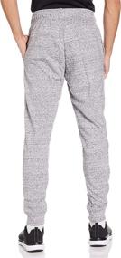img 2 attached to Under Armour Joggers Heather Medium Sports & Fitness in Running