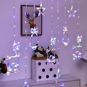 img 1 attached to 🌟 Icicle String Lights with Stars, Elk Bells and Remote Control - Fairy Curtain Lights for Bedroom, Patio, Wall, Christmas and Wedding Decor - Plug-in Curtain Lamp for Party, Indoor and Outdoor Use