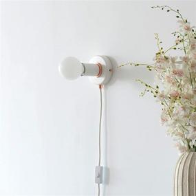 img 1 attached to BRIGHTTIA Matte White Plug-In Simple Ring Wall Sconce Light - Rose Gold Color Accents - Modern Minimalist Lighting - Mid Century Industrial Exposed Bulb Wall Lamp - 16Ft Fabric Cord (BW0005-1AP)