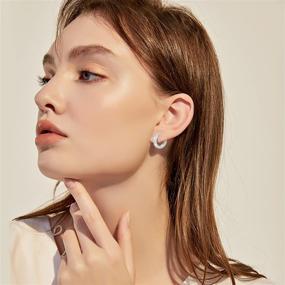 img 1 attached to 💎 Jewlpire Huggie Hoop Earrings 15mm - 18K Gold Plated CZ Diamond Cut Huggies: Hypoallergenic, Cartilage Stud Jewelry Gift for Women and Girls