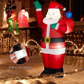 img 1 attached to 🎅 Jumbo Santa Claus Inflatable Yard Decor: 5.5 FT Blow Up Christmas Inflatables with Rotating LED Lights - Perfect for Outdoor Patio, Lawn, and Garden Party Display