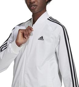 img 2 attached to Стильная и спортивная: женская куртка adidas Essentials 3-Stripe Track Jacket.