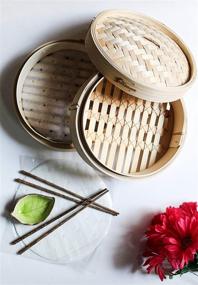 img 3 attached to Authentic Handcrafted 10 Inch Bamboo Steamer - Dual Layer, Perfect for Dim Sum, Bao Buns, Rice, Vegetables, Meat & Fish - Includes 2 Sets of Chopsticks, 20 Liners & Sauce Dish