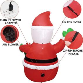 img 1 attached to 🎅 MVP BOY 6FT Inflatable Santa Claus Decoration with Built-in LED Lights for Xmas Party Vacation Home Garden Lawn Patio - Outdoor/Indoor Christmas Blow up Santa Holding Gift Box