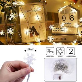 img 2 attached to 🎄 Roberly 32.8 Feet 80 LED Snowflake String Lights for Christmas, Winter Fairy Lights Battery Operated Waterproof for Patio Party Bedroom Home Decor Indoor Outdoor Xmas Tree Decorations in Warm-White