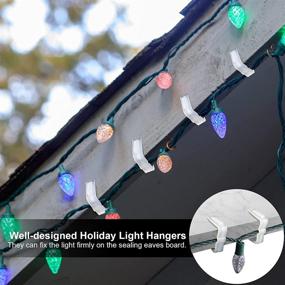 img 1 attached to 🎄 Pack of 50 Christmas Light Hanger Hooks 2 inch (1 5/8 inch) - Weatherproof Plastic Clips for Fascia Boards, Outdoor Holiday Light Clip for Christmas Party Decorations, Roof Gutter, Fence, Eave (2 Inch)