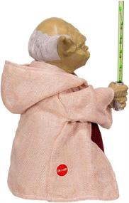 img 2 attached to 🎄 Kurt Adler 12-Inch Battery-Operated Star Wars Yoda Treetop with LED Lightsaber - the Perfect Christmas Decoration