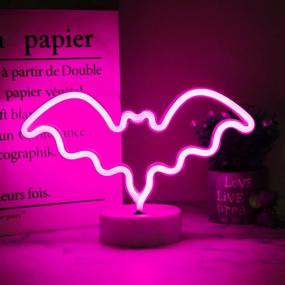 img 3 attached to Spooky LED Neon Bat Lights Halloween Decorations for Bedroom and Bar - Pink Bat Shape Night Lights, Battery Operated Table Lamp with Holder Base