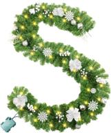 🎄 9-foot rocinha christmas garland with 50 led battery-powered lights, festive ball ornaments, snowflakes, and silver white berries - ideal for mantle, fireplace, stairs, and banister decoration logo