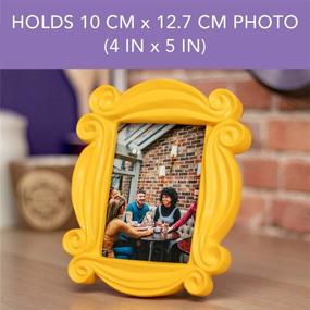 img 1 attached to 🖼️ Enhance Your Home Decor with the Paladone Peephole Picture Frame - Friends TV Show's Officially Licensed Merchandise