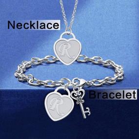 img 1 attached to Personalized Stainless Steel Heart Key Initial Necklace Bracelet Set for Teen Girls - Ideal Christmas Gift; 26 Letter Chain Necklaces with Name Locket Bracelet; Perfect Birthday Gift for Friends - Complete with Jewelry Bag