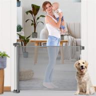 👶 versatile and stylish retractable grey mesh baby gate: 35" tall, expands to 65" wide, ideal for stairs, doorways, and outdoor pet safety logo