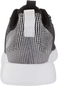 img 2 attached to adidas Men's Questar Flow Sneaker: Black/White Running Shoe for Optimal Performance