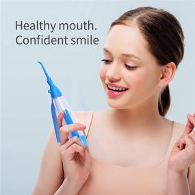 img 2 attached to 💧 Non-Electric Portable Water Flosser - Affordable Oral Irrigator for Home and Travel - Cordless Manual Air Pressure - Simple Operation - Water Pick Teeth Cleaner (Blue)