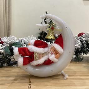 img 1 attached to 🎅 Christmas Kids Gifts, Electric Santa Claus Toys with Lights & Music, Santa Claus Sleeping On The Moon, Window/Door/Wall/Tree Home Decorations for Christmas, White