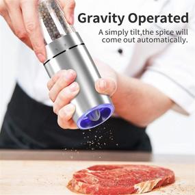 img 3 attached to Set of 2 Electric Gravity Pepper Grinders, Automatic Salt and Pepper Mill Grinder Set, Adjustable Coarseness, Battery Powered, Blue LED Light, Stainless Steel, One-Handed Operation (Silver, Pack of 2)