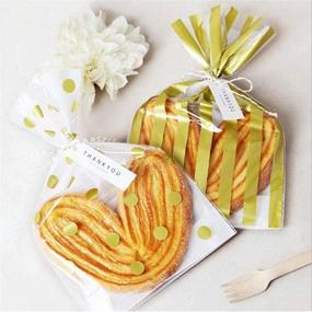 img 1 attached to 🍬 OFNMY 100pcs Gold Polka Dot and Striped Candy Bags with Twist Ties - 6x10 inch Cellophane Cookie Bags for Treats