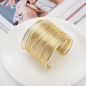 img 1 attached to 💫 Exquisite COLORFUL BLING: Enhance Your Style with this 4 Piece Punk Open Wide Cuff Bangle Exaggerated Snake Carved Wire Wrist Bracelet Wrap Cuff Jewelry for Women