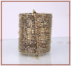 img 3 attached to 💫 Tribal Chic Gold Metal Spiral Cuff/Bracelet: A Stylish Accessory for Girls and Women