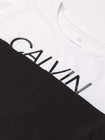 img 1 attached to Stylish and Comfortable: Calvin Klein Girls' Performance Short Sleeve Tee Shirt