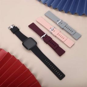 img 1 attached to 🌈 CAVN 4-Pack Sport Bands Compatible with Fitbit Versa 2/Versa/Versa Lite - Silicone Bands for Women Men - Replacement Wristband Watch Strap Accessories in Black/Peach/Grey/Wine Red - Size L (6.5''-8.9'')