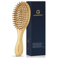 bamboo paddle hairbrush with gentle detangling bristles - massaging scalp hair brush for effortless styling logo