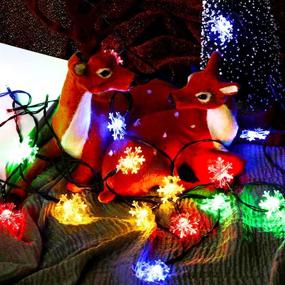 img 1 attached to 🎄 Multicolor Christmas Snowflake String Lights - 20 Ft Fairy Waterproof Snowflake Lights with 2 Modes for Outdoor Indoor Bedroom Party Xmas Garden Patio Tree Decorations - Battery Operated