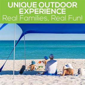 img 1 attached to KAZZARY Beach Tent Pop Up Canopy Sun Shelter UPF50+ Lightweight Outdoor Shade with Frisbee Shovel, Ground Pegs 🌞 and Stability Poles, Portable Set for Family Fun Trips - 10x10 FT 4 Pole, Bright Blue - Enhanced SEO