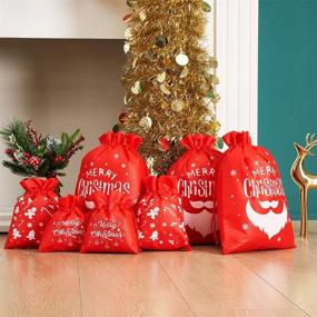 img 1 attached to 🎁 CCINEE Christmas Goody Bags - Set of 12 Xmas Drawstring Gift Bags for Holiday Party Wrapping