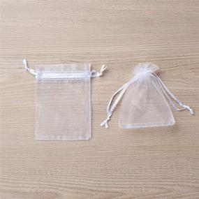 img 2 attached to 🎁 MAZYPO 100pcs White Organza Bags 2x3 inch - Perfect Sheer Drawstring Gift Bags for Jewelry, Weddings, Parties & More!