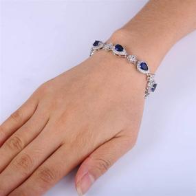 img 1 attached to 💎 Набор колье V-образного кроя с каплевидными цветами из циркония Silver-Tone с теннисным браслетом и серьгами-капельками - EleQueen для свадебных подружек