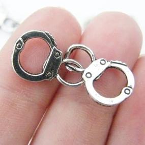 img 1 attached to Set of 10 Antique Silver Tone Handcuff Charms (NS651) - Enhance SEO