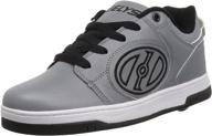 👟 heelys voyager reflective medium girls' athletic tennis shoes: effortlessly roll and shine! logo