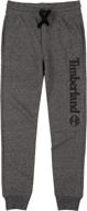 👖 heather boys' fleece jogger sweatpants by timberland - versatile clothing and pants logo